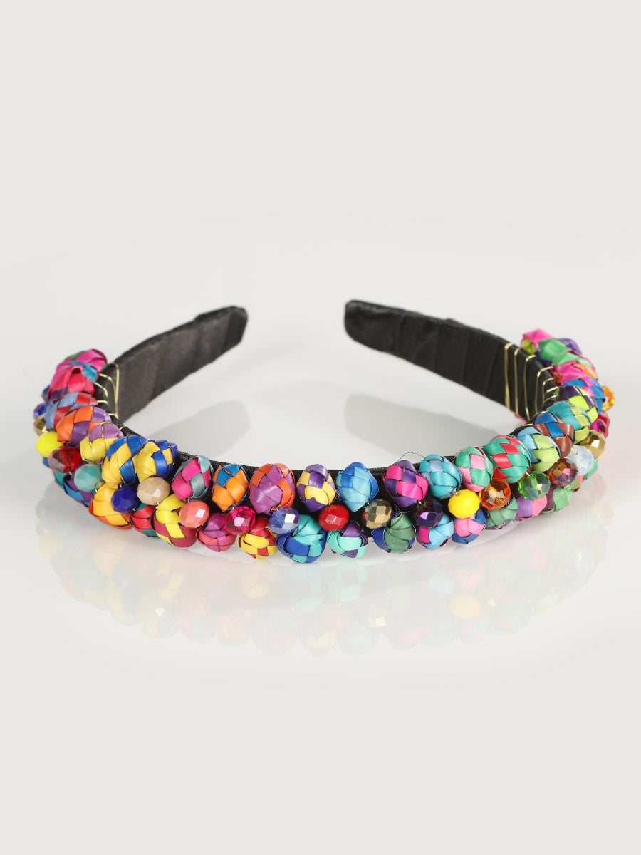 Diadema artesanal hecha a mano con hojas de palma multicolor